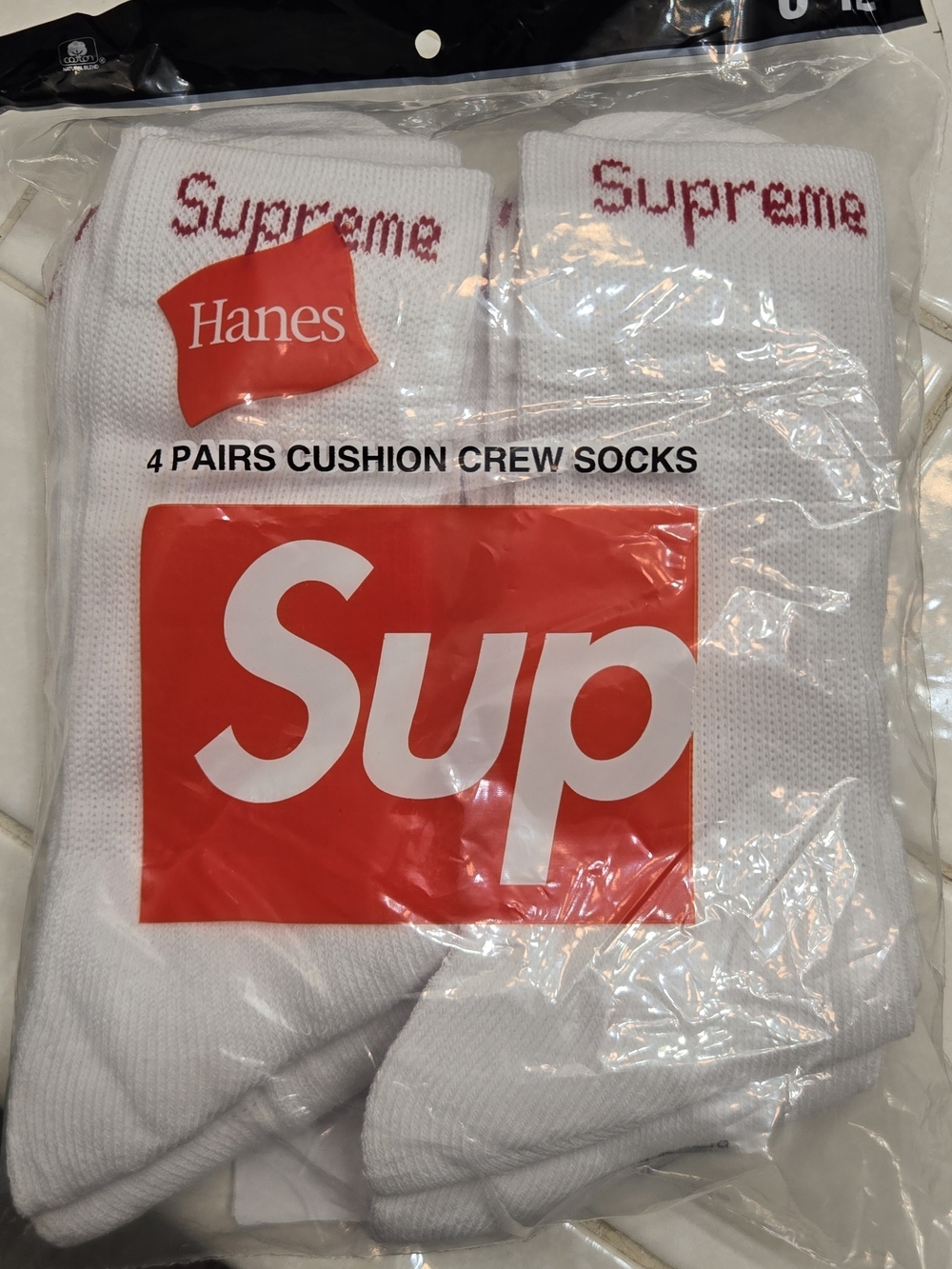 Hanes White Crew Socks with Red Supreme Logo – 4 Pairs